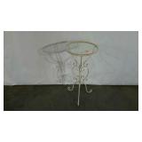 Plant stand, painted wrought iron, visible rust,