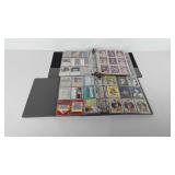 Two collector card albums full of baseball cards,