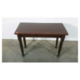 Repurposed table made from two wood types.