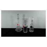 Three lead crystal decanters, one is signed and