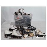 Group of ice skates, various sizes, all well used