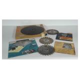 Seven circular saw blades in various sizes and