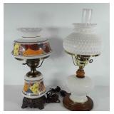 Two hurricane lamps, includes one with "patchwork
