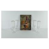 Wine decor plaque and four gold rimmed champagne