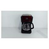 Mr. Coffee, coffee maker, powers on