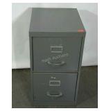 Metal two drawer file cabinet, 28" tall, damage