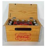 Coca-Cola crate alarm radio. Powers on. Measures