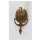Brass eagle door knocker. 8 inches long. Marked