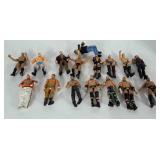 16 wrestling action figures.