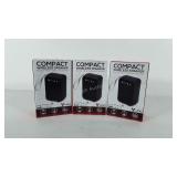 Three unopened compact wireless speakers