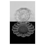 Two clear glass egg plates