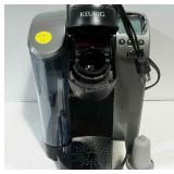Keurig coffee maker, powers up