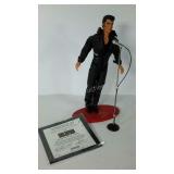 Elvis collector doll on stand with microphone and