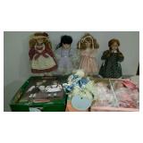 Group of nine dolls, some in package, some with