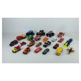 Group of die-cast cars and monster trucks