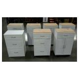 Seven cabinets. Four are double door with upper