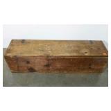 Rustic wooden storage box with hinged top.