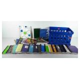 Crate of notebooks and composition books