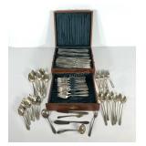 Chest with silverplate flatware, mostly same