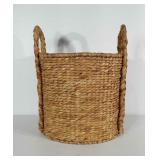 Woven basket with handles.  Stands 16" tall