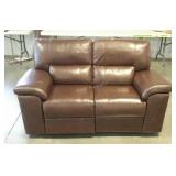 Double power recliner in brown vinyl. Needs a