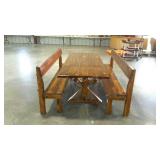 Large trestle table with two benches with backs.