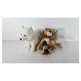 Four stuffed animals includes Ganz lion and arctic
