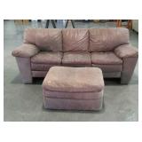 Leather couch and matching ottoman. Both well