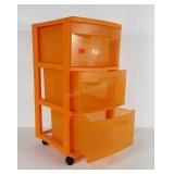 Orange 3 drawer storage tote on wheels. Measures