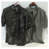 Two Huk brand button up shirts size medium