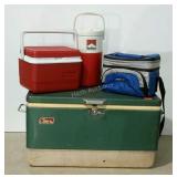 Cooler assortment.  Older Coleman metal wrapped