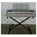 Yamaha keyboard with stand, works