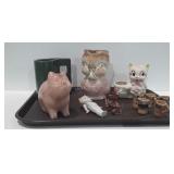 Ceramic, clay figurines including a piggy bank, a