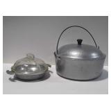 Two pieces of aluminum cookware 1 is Guardian with