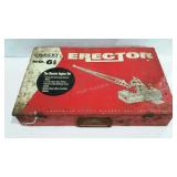 Erector set in metal box,  rust and wear as shown