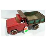 Tonka dump truck, may have been painted, crack in