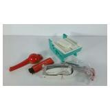 Kitchen gadgets. Cherry pitter, apple corer,