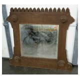 Old mirror with decorative medallion details, 35"