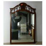 Beautifully framed wall mirror with carved