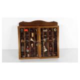 Curio wall cabinet full of curiosities,