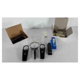 Office supplies, staplers, magnifying glasses,
