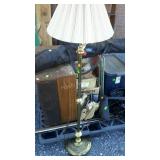 Skid lot: floor lamp, skis in a bag, window panes