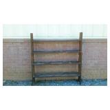 Open bookcase/shelving. Not a stand alone, needs