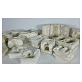 Group of ceramic molds, includes vases, mugs,