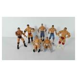 Seven WWE action figures