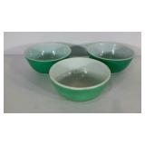 Three green Pyrex bowls, condition as shown