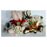Group of plush animals, many still have tags on