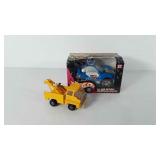 Toys, metal truck and unopened battery operated