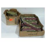 Two open boxes of nails. Bostitch and Paslode.