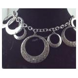Silvertone circle necklace